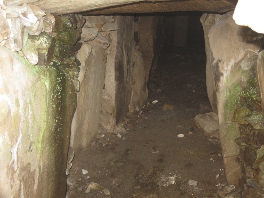 Inside a passage leading to one of the eleven burial chambers of Barnenez